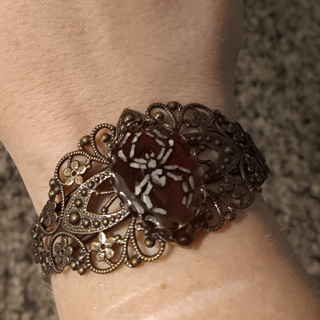 Elegant Brown Filigree Spider Bracelet